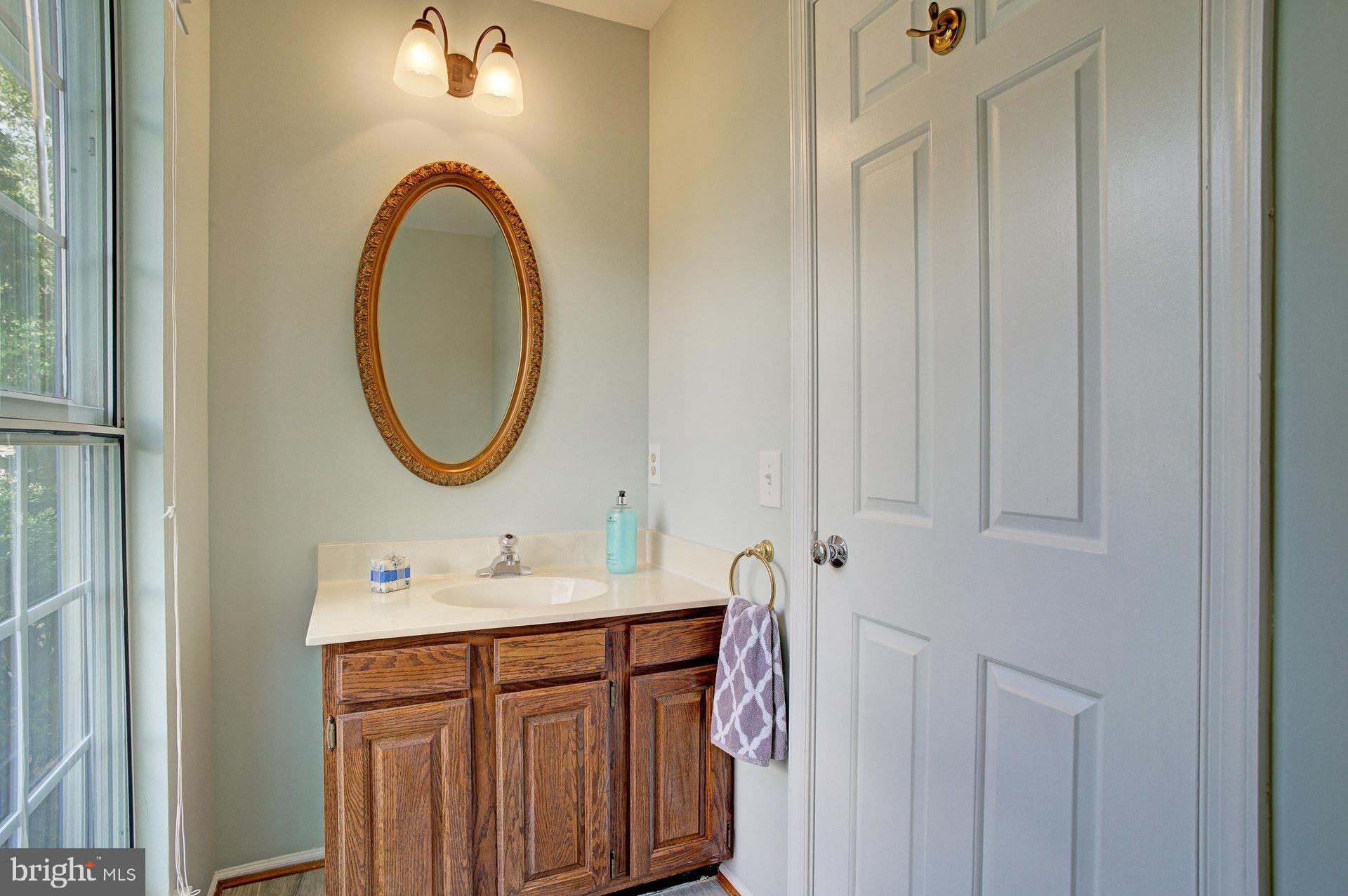 5994 Powell's Landing Road Burke, VA 22015 - Photo 13 of 31 Powder room on main level
