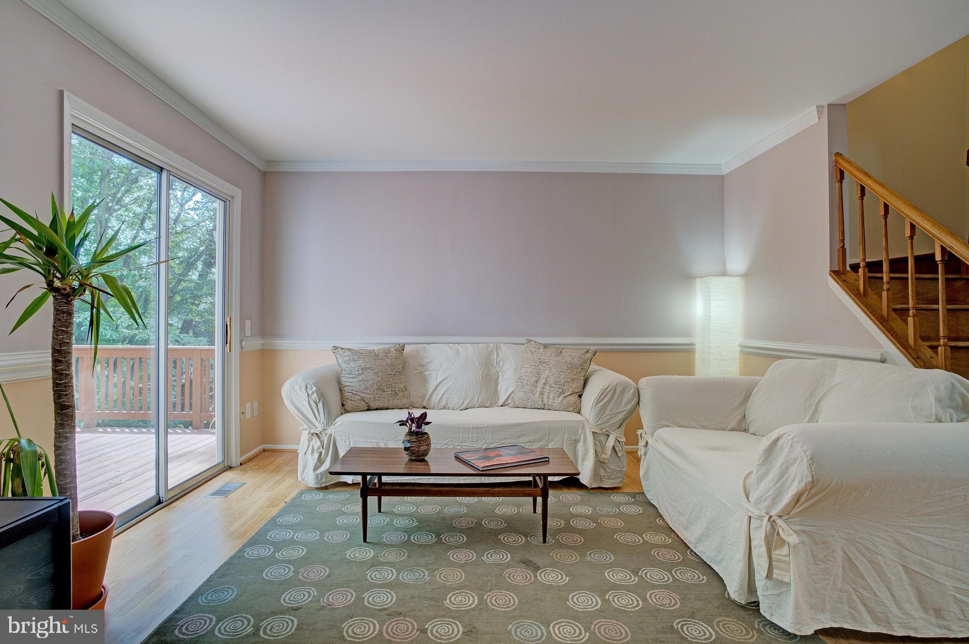 5994 Powell's Landing Road Burke, VA 22015 - Photo 6 of 31 Spacious living area leads to deck