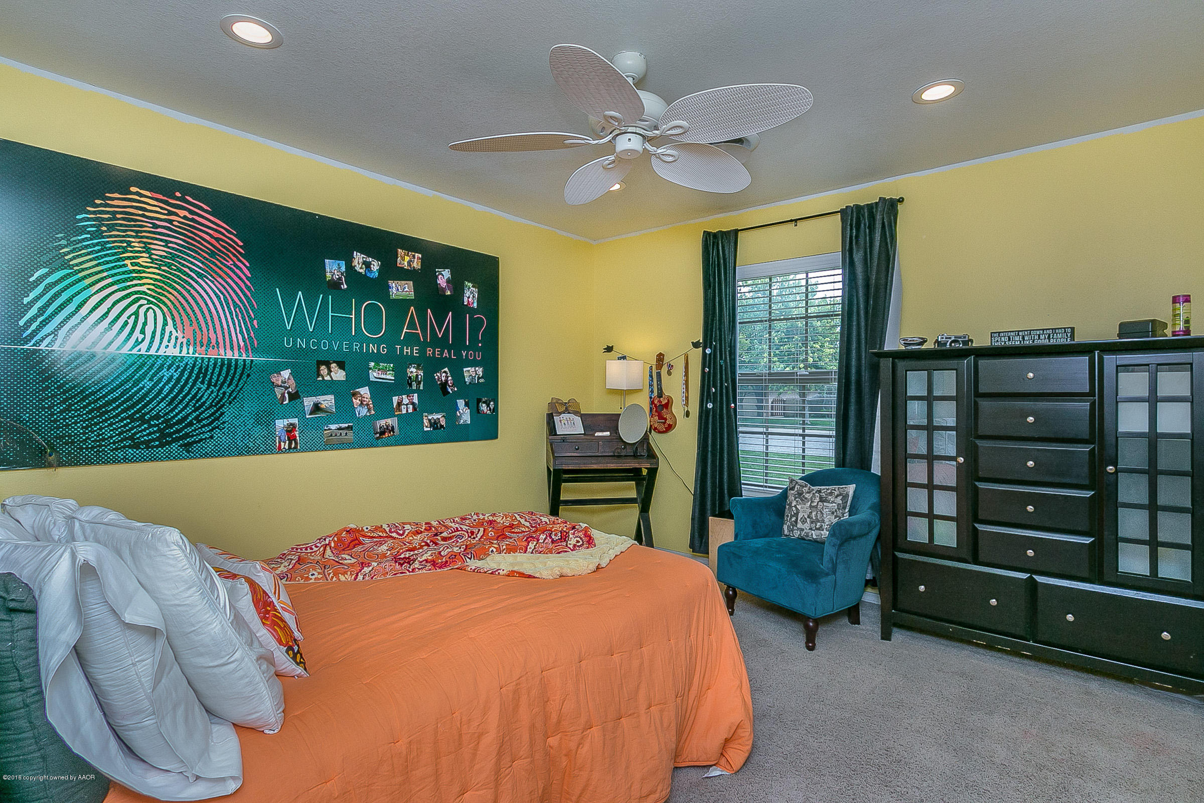 7109 Jameson Road Amarillo, TX 79106 - Photo 19 of 25 a bed room with a bed and a television