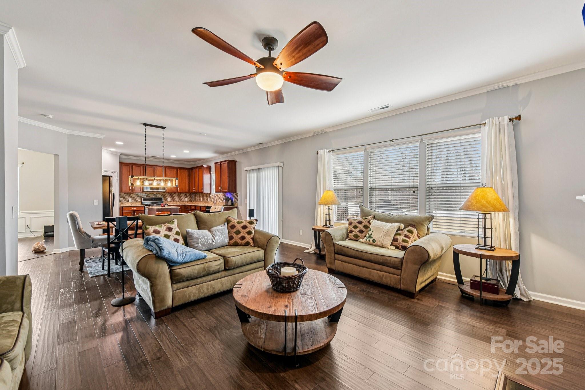 8826 Gray Willow Road Charlotte, NC 28227 - Photo 15 of 47 a living room with furniture a rug and a large window