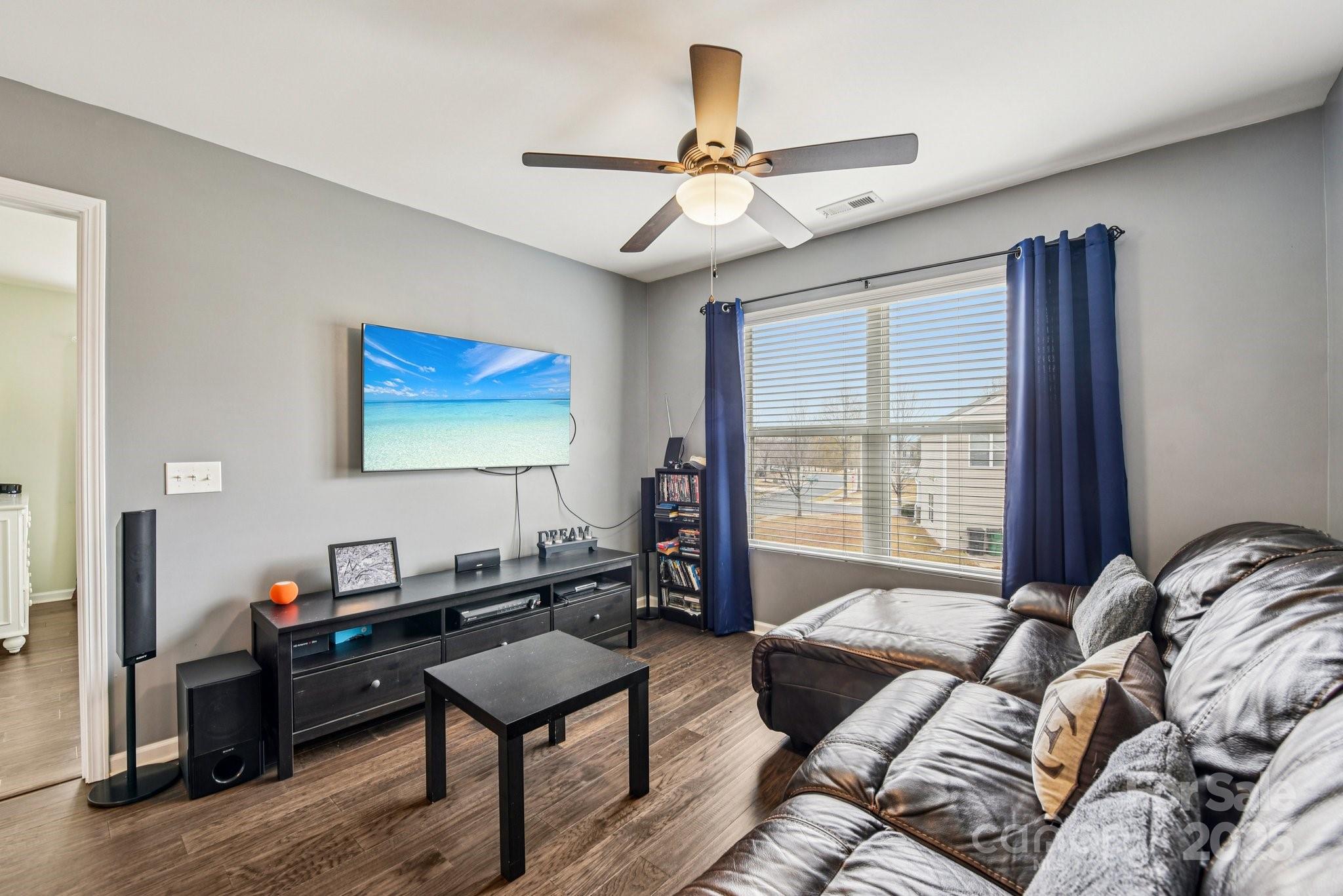 8826 Gray Willow Road Charlotte, NC 28227 - Photo 24 of 47 a living room with furniture and a window