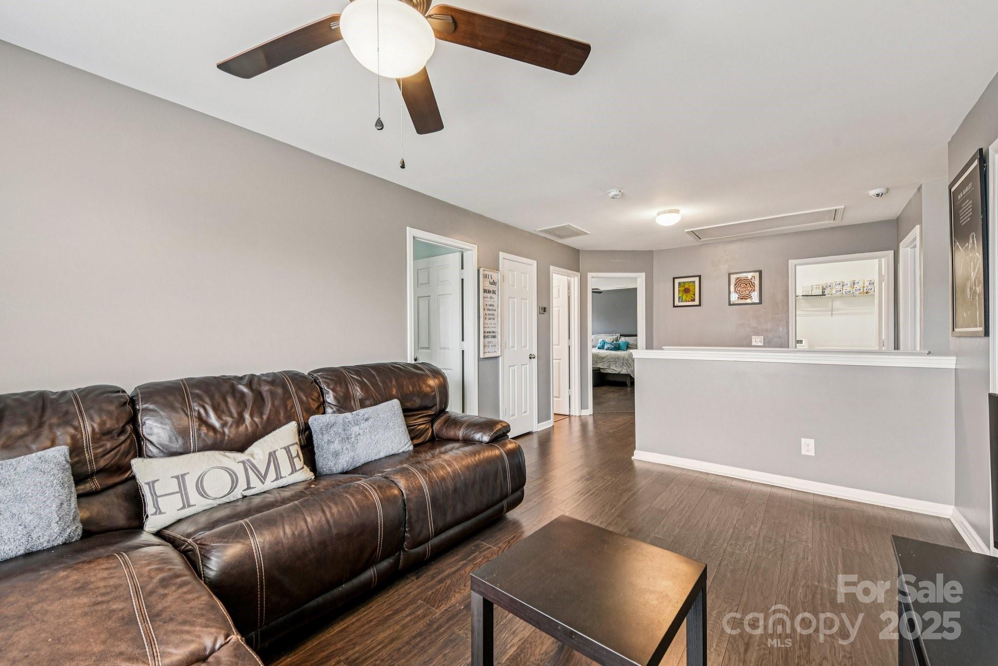 8826 Gray Willow Road Charlotte, NC 28227 - Photo 26 of 47 a living room with furniture and a window