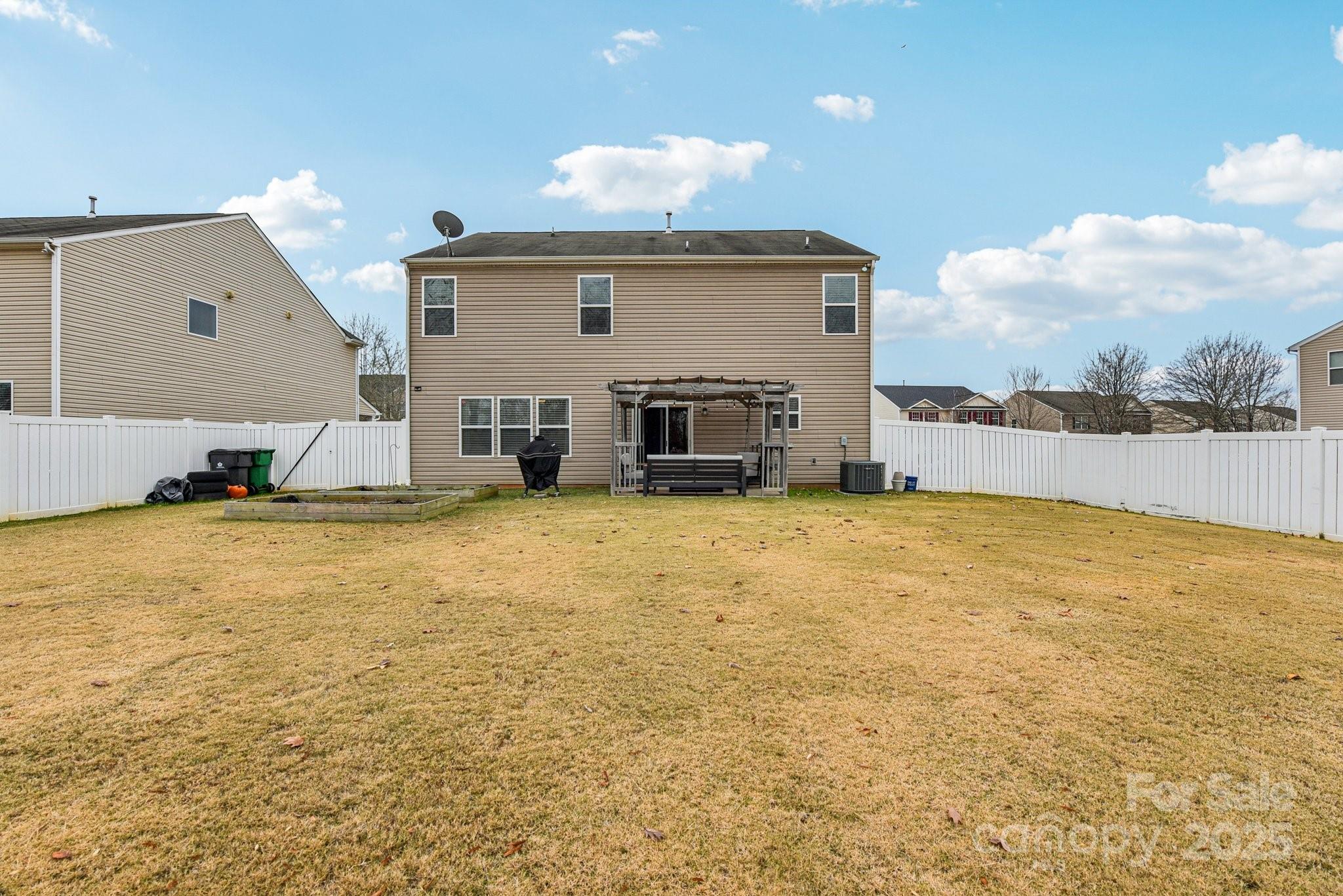 8826 Gray Willow Road Charlotte, NC 28227 - Photo 38 of 47 a swimming pool with outdoor seating and yard