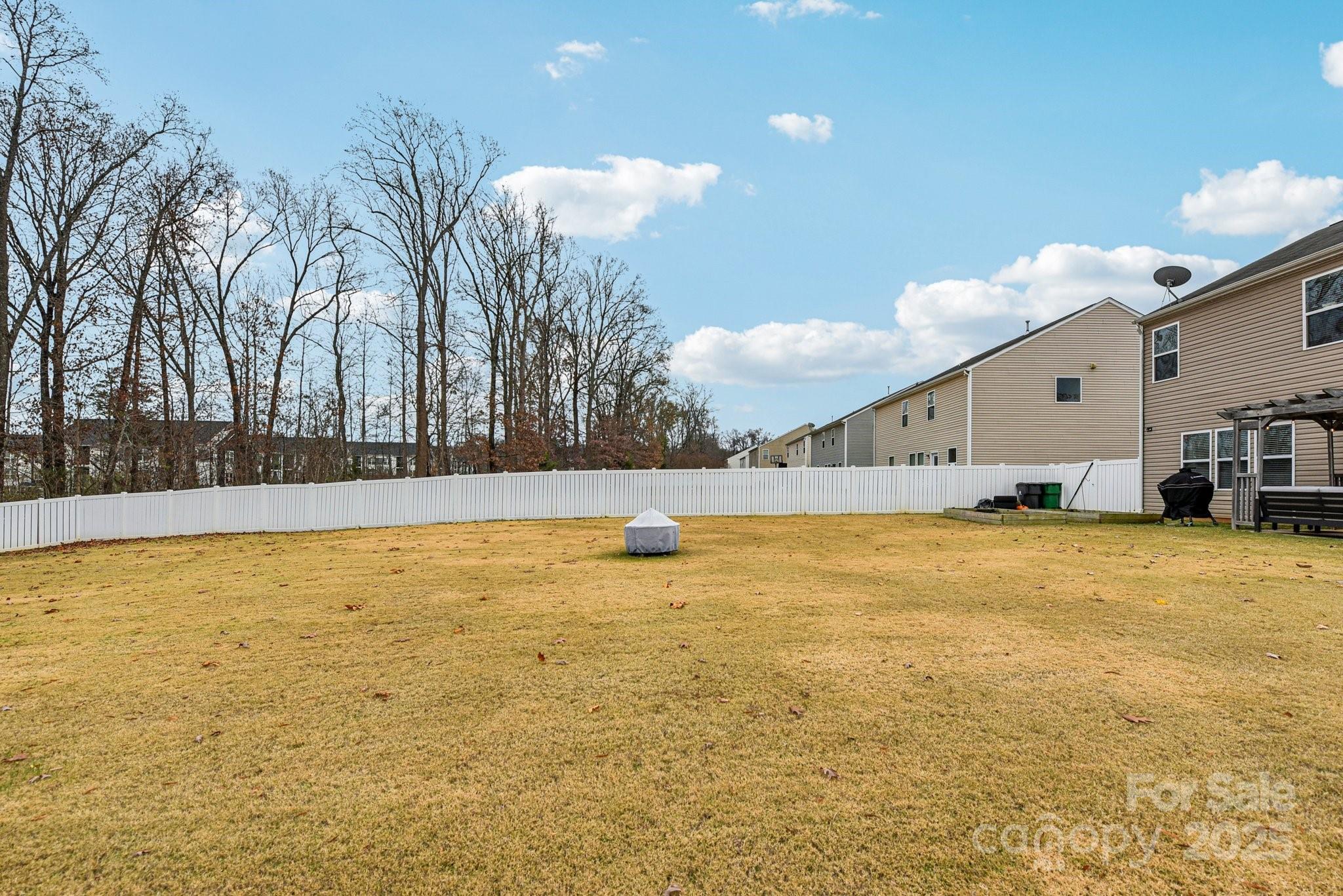 8826 Gray Willow Road Charlotte, NC 28227 - Photo 41 of 47 a swimming pool with an outdoor space and seating area
