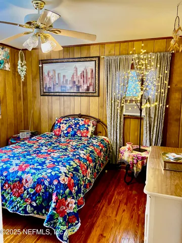 a view of a house with a yard and garage