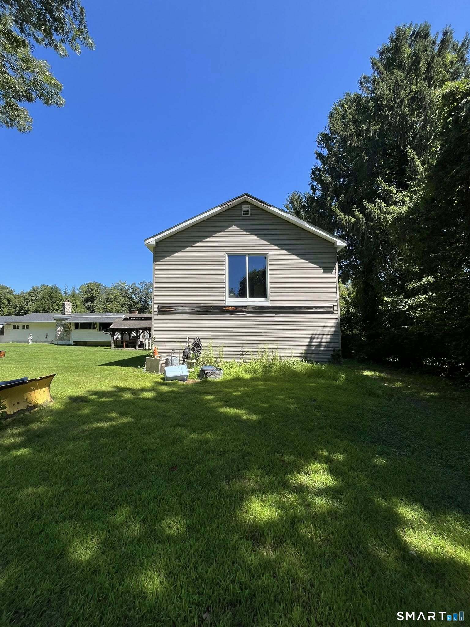62 Old Hawleyville Road Bethel, CT 06801 - Photo 35 of 46 a front view of a house with a yard