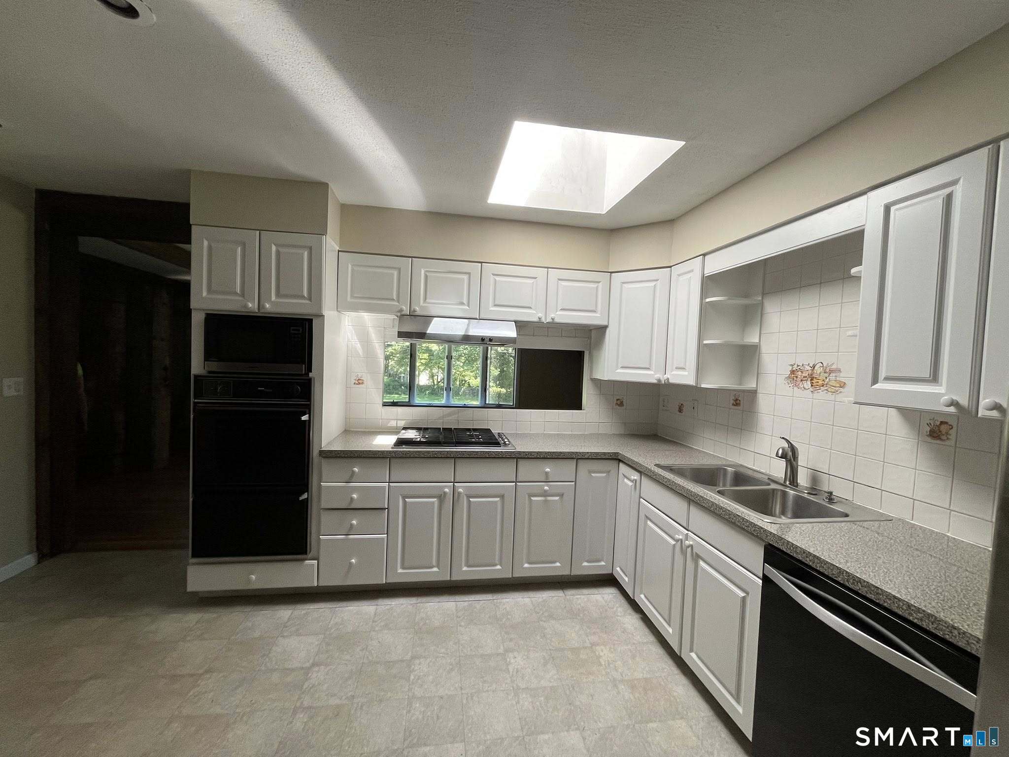 62 Old Hawleyville Road Bethel, CT 06801 - Photo 8 of 46 a kitchen with stainless steel appliances granite countertop a sink and a stove