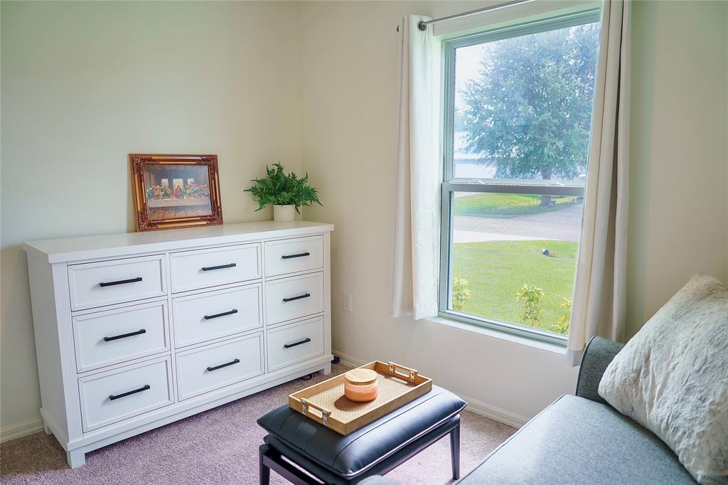 1229 Southwest San Antonio Avenue Port St. Lucie, FL 34953 - Photo 14 of 31 a living room with furniture and a window