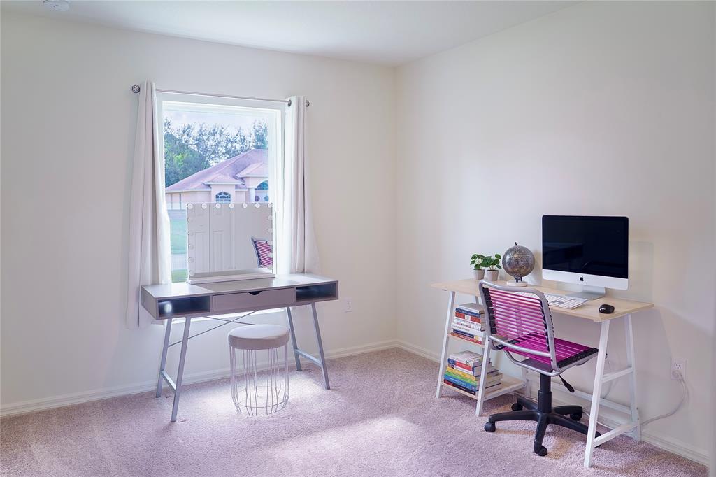 1229 Southwest San Antonio Avenue Port St. Lucie, FL 34953 - Photo 15 of 31 a view of a workspace with furniture