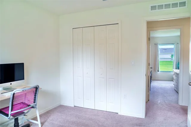 a view of a room with a workspace