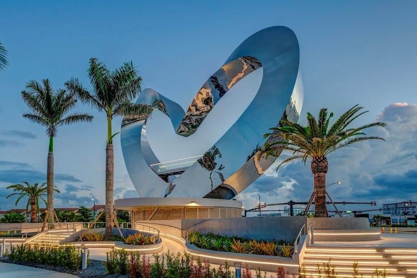 1229 Southwest San Antonio Avenue Port St. Lucie, FL 34953 - Photo 26 of 31 a table with chairs and a potted plant