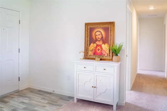 a view of an entryway with front door