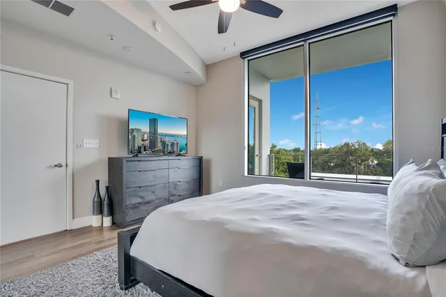 a bathroom with a double vanity sink toilet and shower