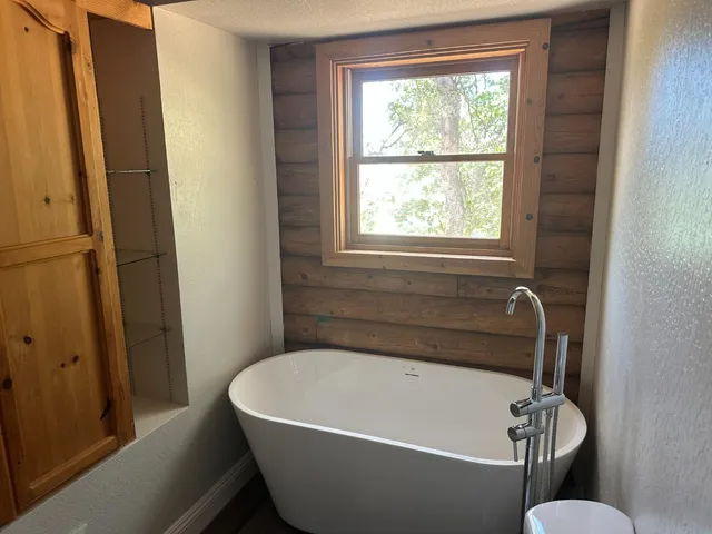 a view of a backyard of the house