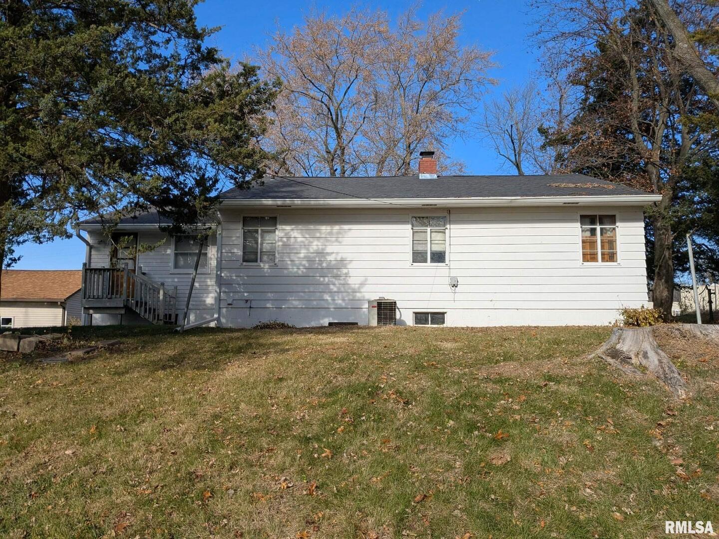 1028 Coyne Center Road Milan, IL 61264 - Photo 19 of 21 a house view with a garden space