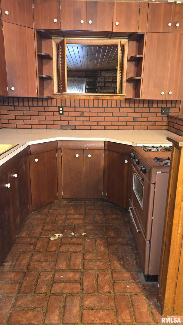 1028 Coyne Center Road Milan, IL 61264 - Photo 8 of 21 a bathroom with a sink vanity and mirror