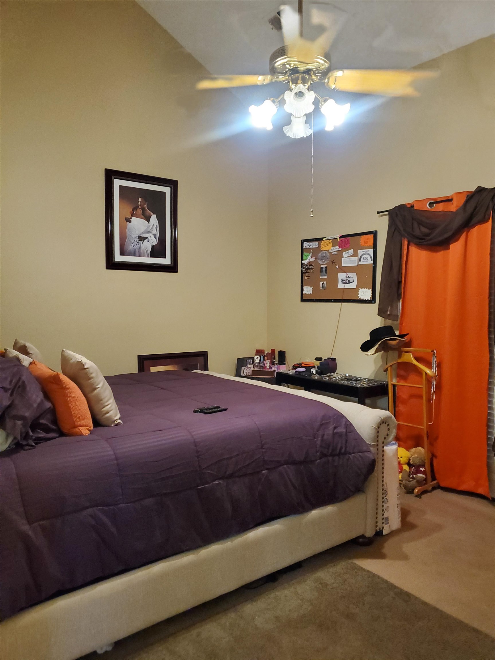 6769 Ross Ridge Drive Memphis, TN 38141 - Photo 14 of 25 a bedroom with a bed and a chandelier