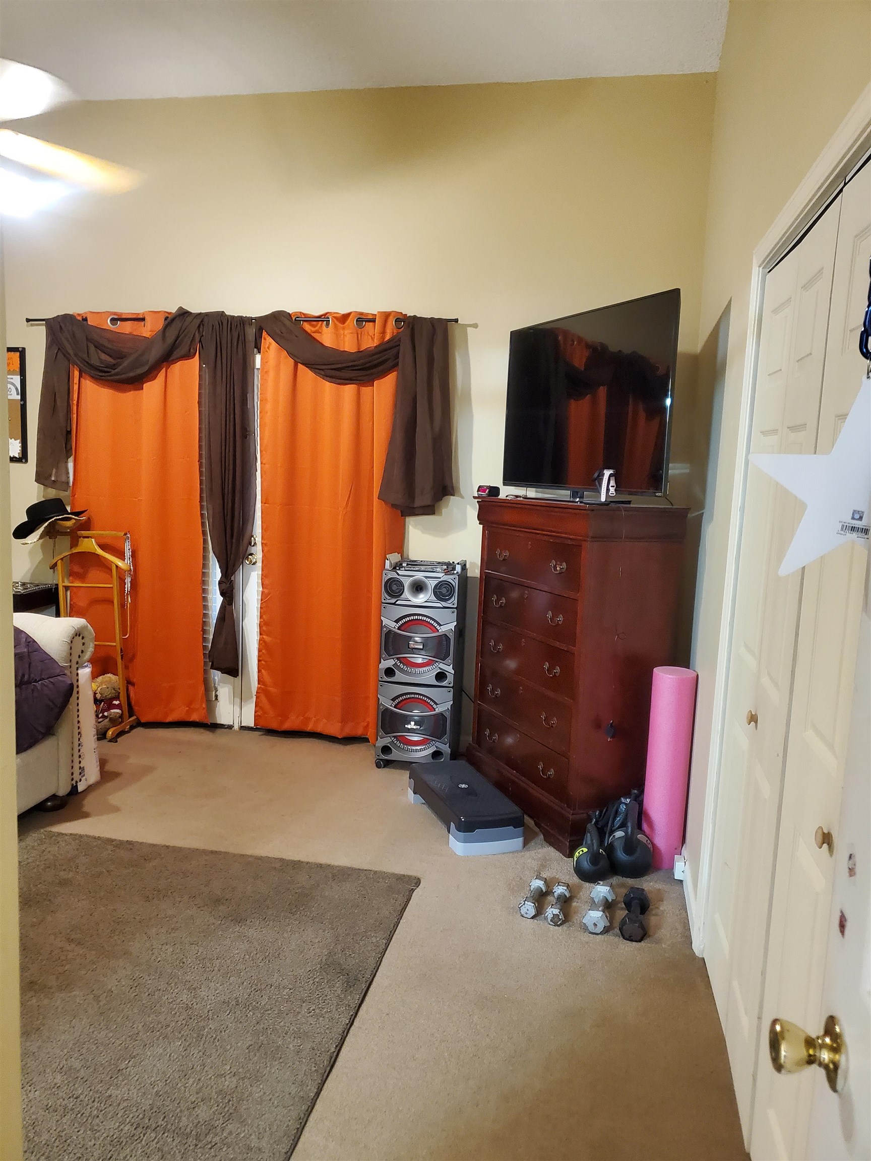 6769 Ross Ridge Drive Memphis, TN 38141 - Photo 15 of 25 a view of a room with furniture and a flat screen tv