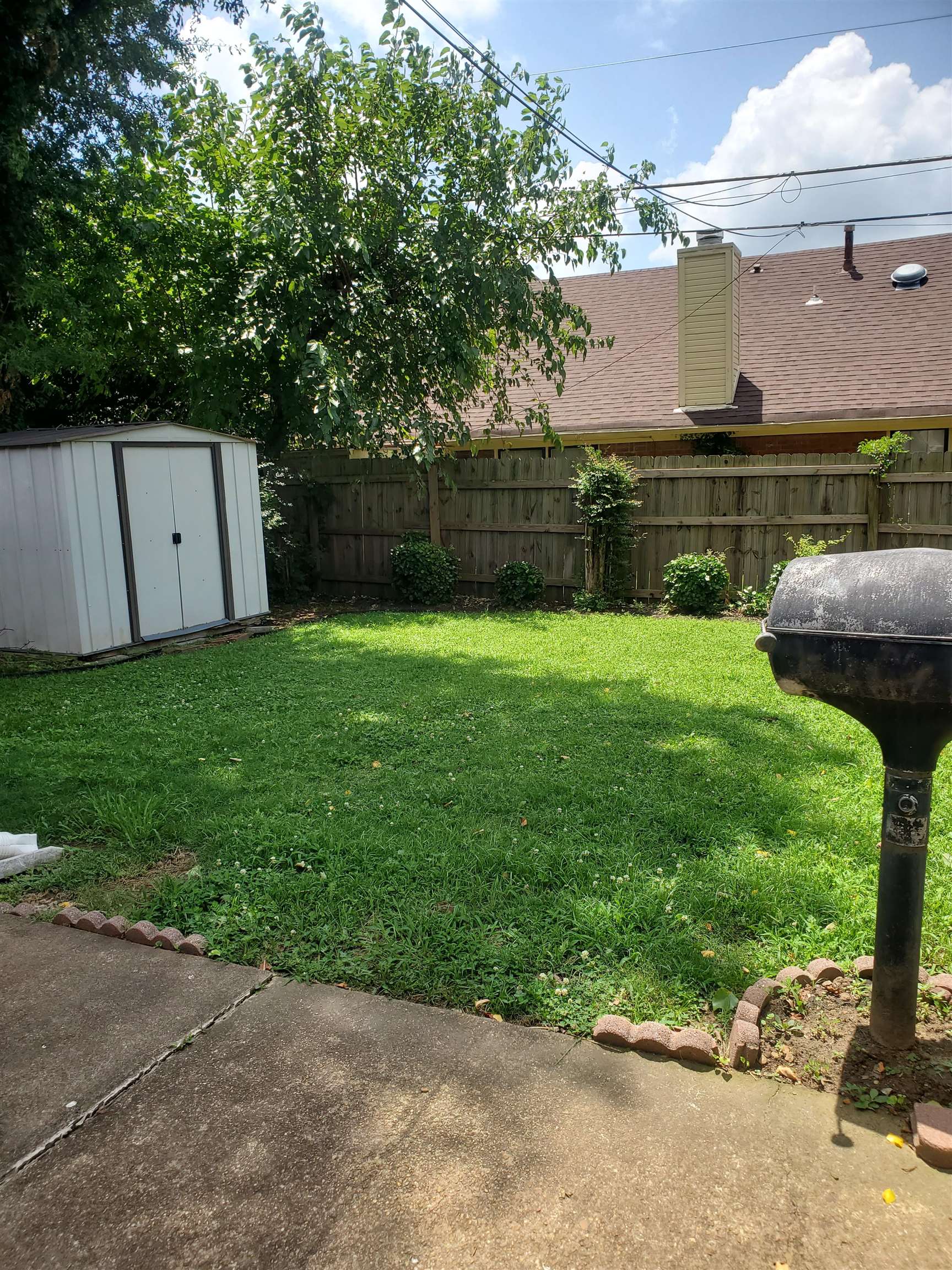 6769 Ross Ridge Drive Memphis, TN 38141 - Photo 25 of 25 a view of a garden with a slide