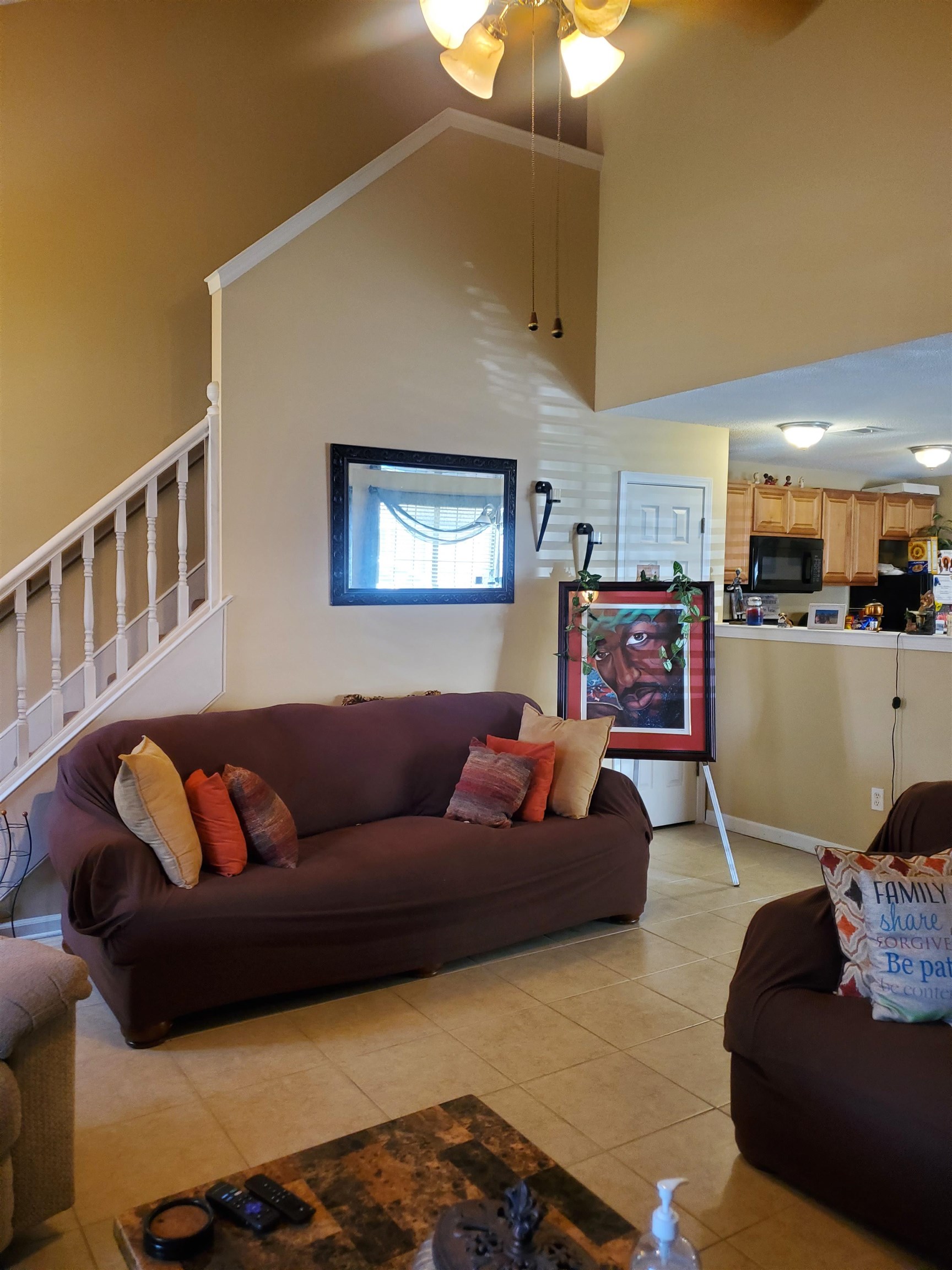 6769 Ross Ridge Drive Memphis, TN 38141 - Photo 6 of 25 a living room with furniture and kitchen view