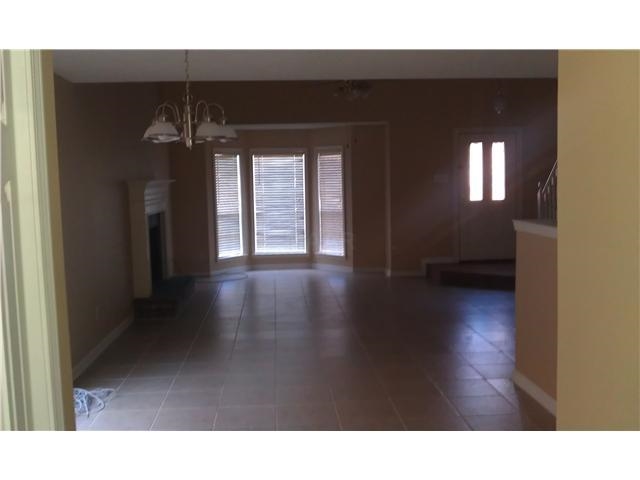 6769 Ross Ridge Drive Memphis, TN 38141 - Photo 8 of 25 a open hall with a lot of white walls