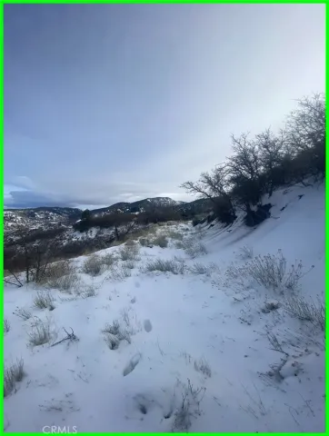 a view of outdoor space with mountain view