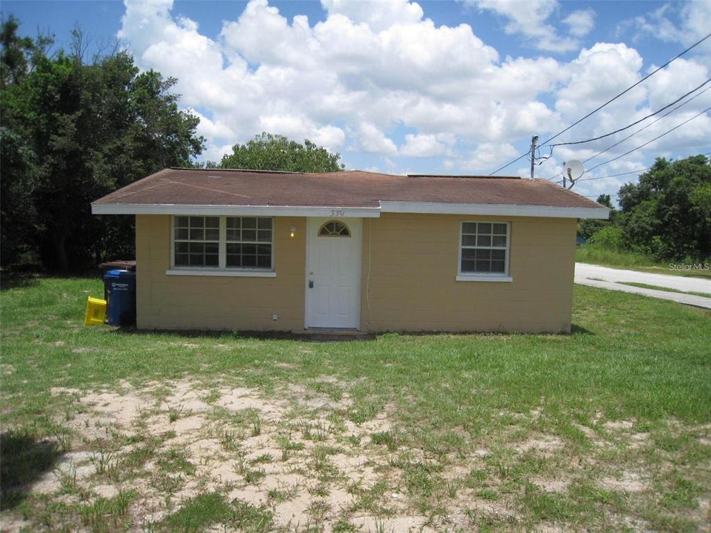 330 Kokomo Road Haines City, FL 33844 - Photo 1 of 1 a view of a house with a yard