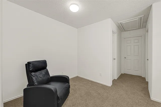 a view of livingroom with furniture