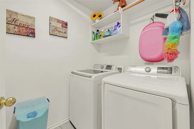 a bathroom with a sink mirror and vanity