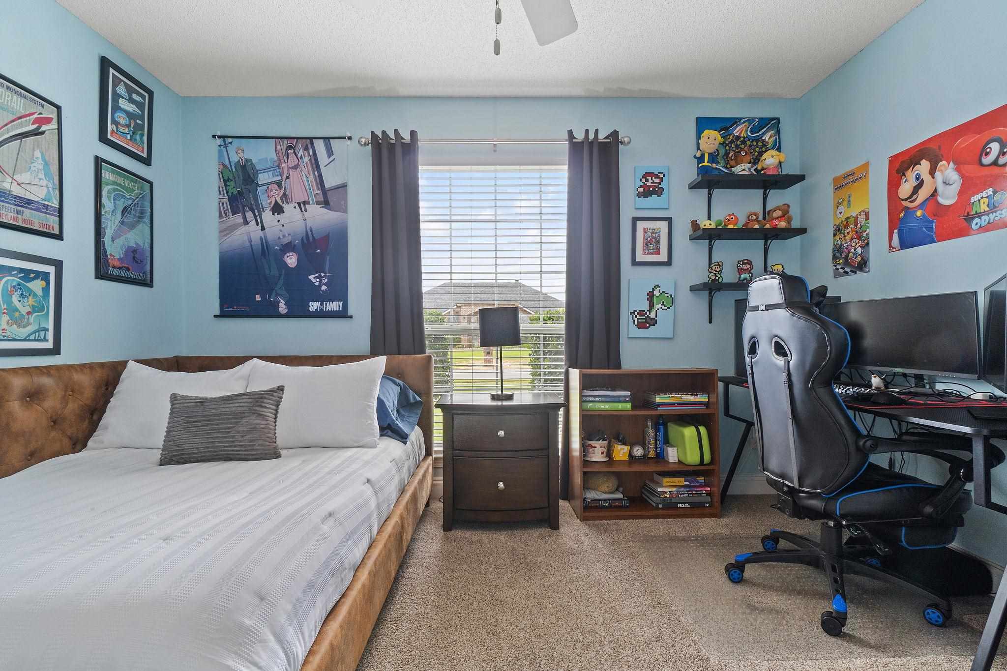 4248 Chittingham Drive Pace, FL 32571 - Photo 30 of 43 a bedroom with a bed and a desk