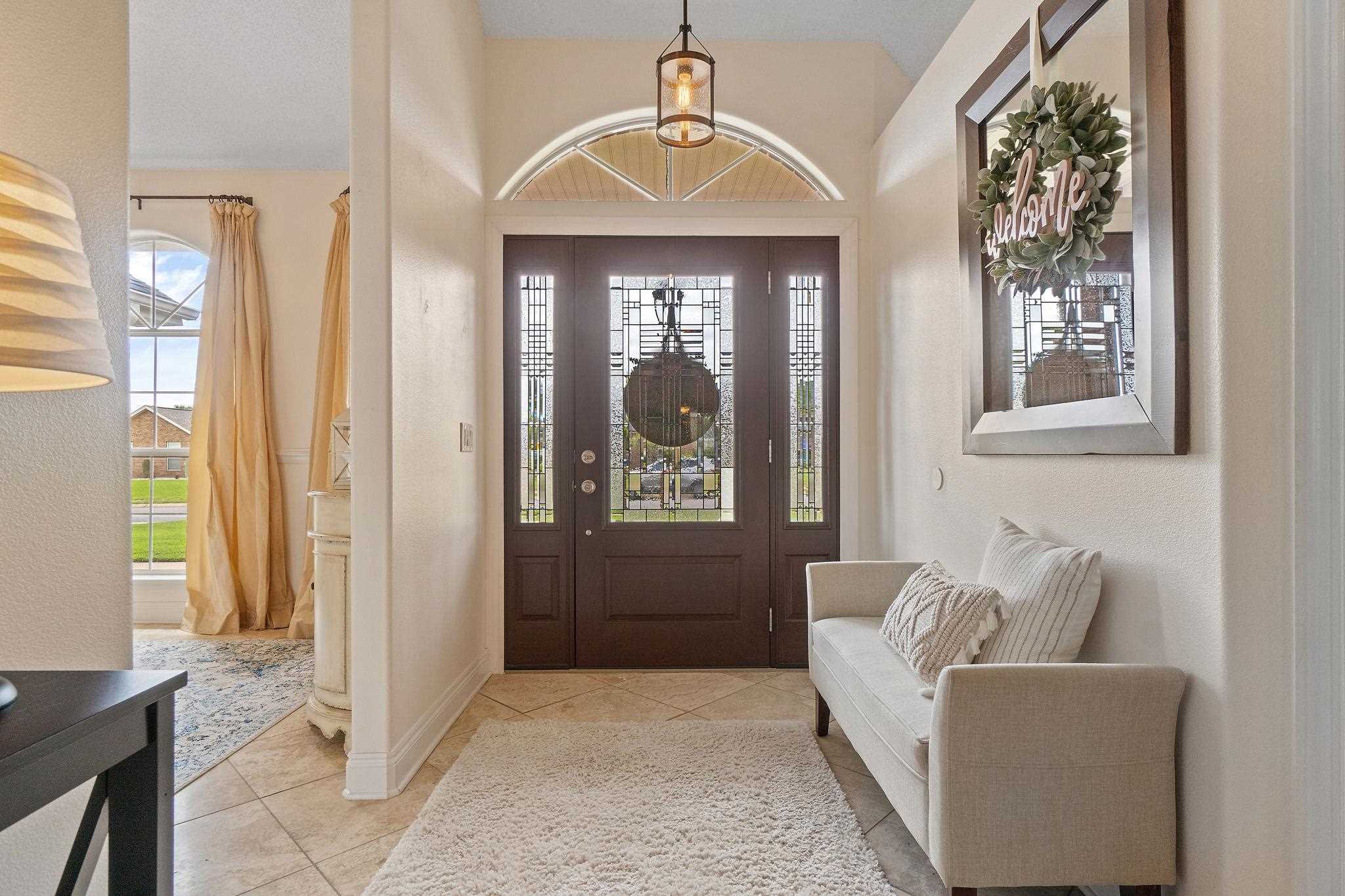 4248 Chittingham Drive Pace, FL 32571 - Photo 5 of 43 a living room with furniture and a window