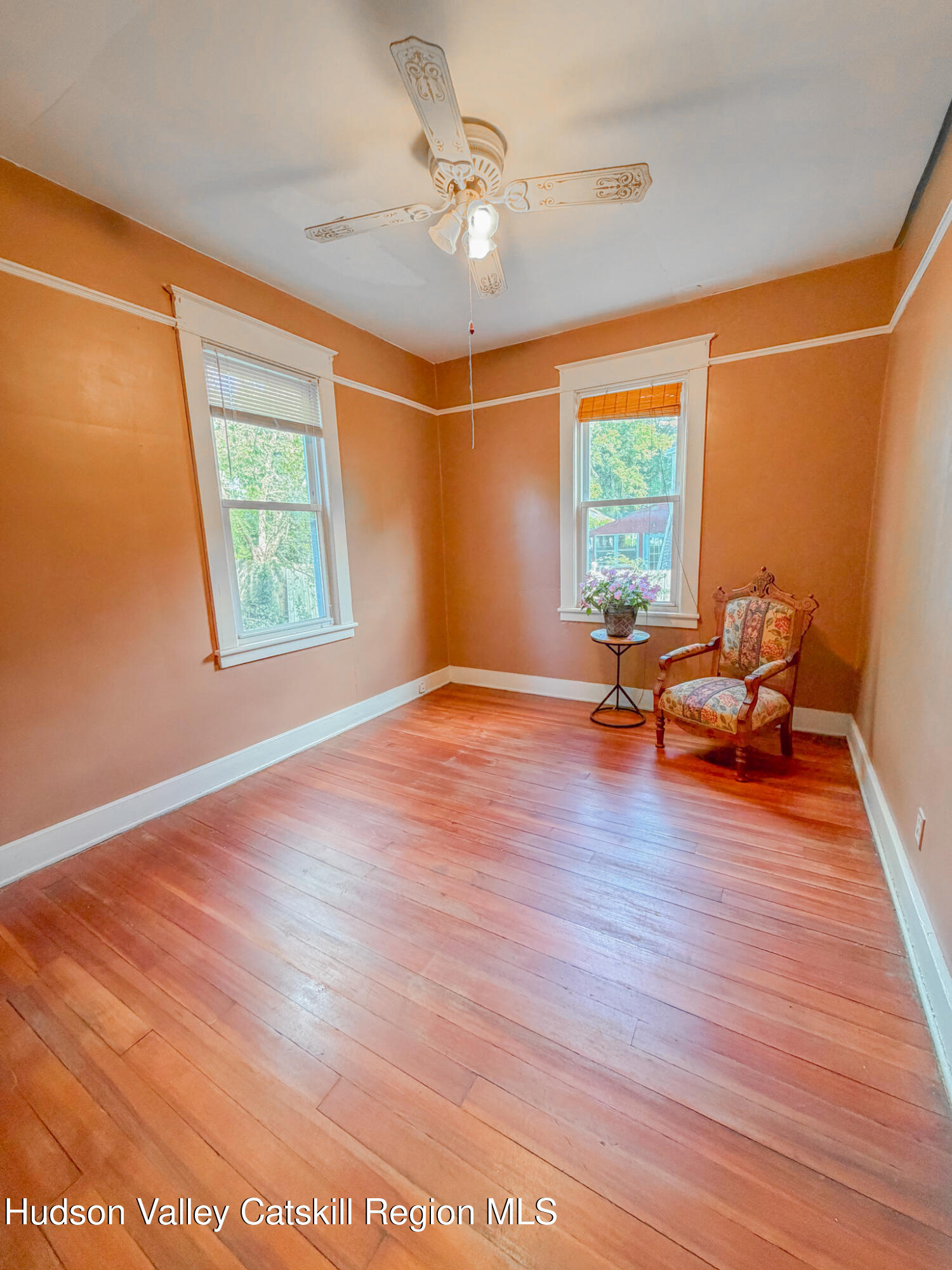11 3rd Port Ewen, NY 12466 - Photo 12 of 34 a view of livingroom with hardwood floor and ceiling fan