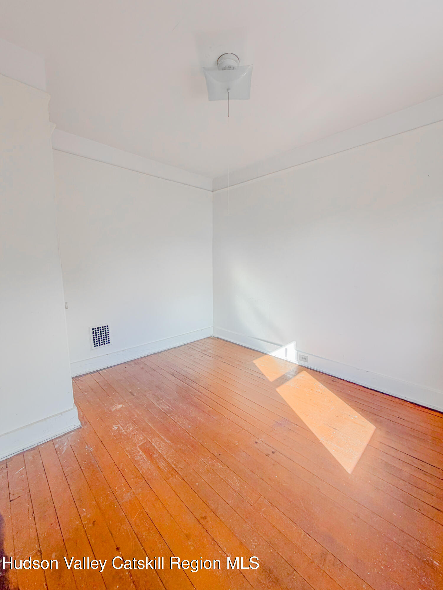11 3rd Port Ewen, NY 12466 - Photo 18 of 34 a view of empty room with wooden floor