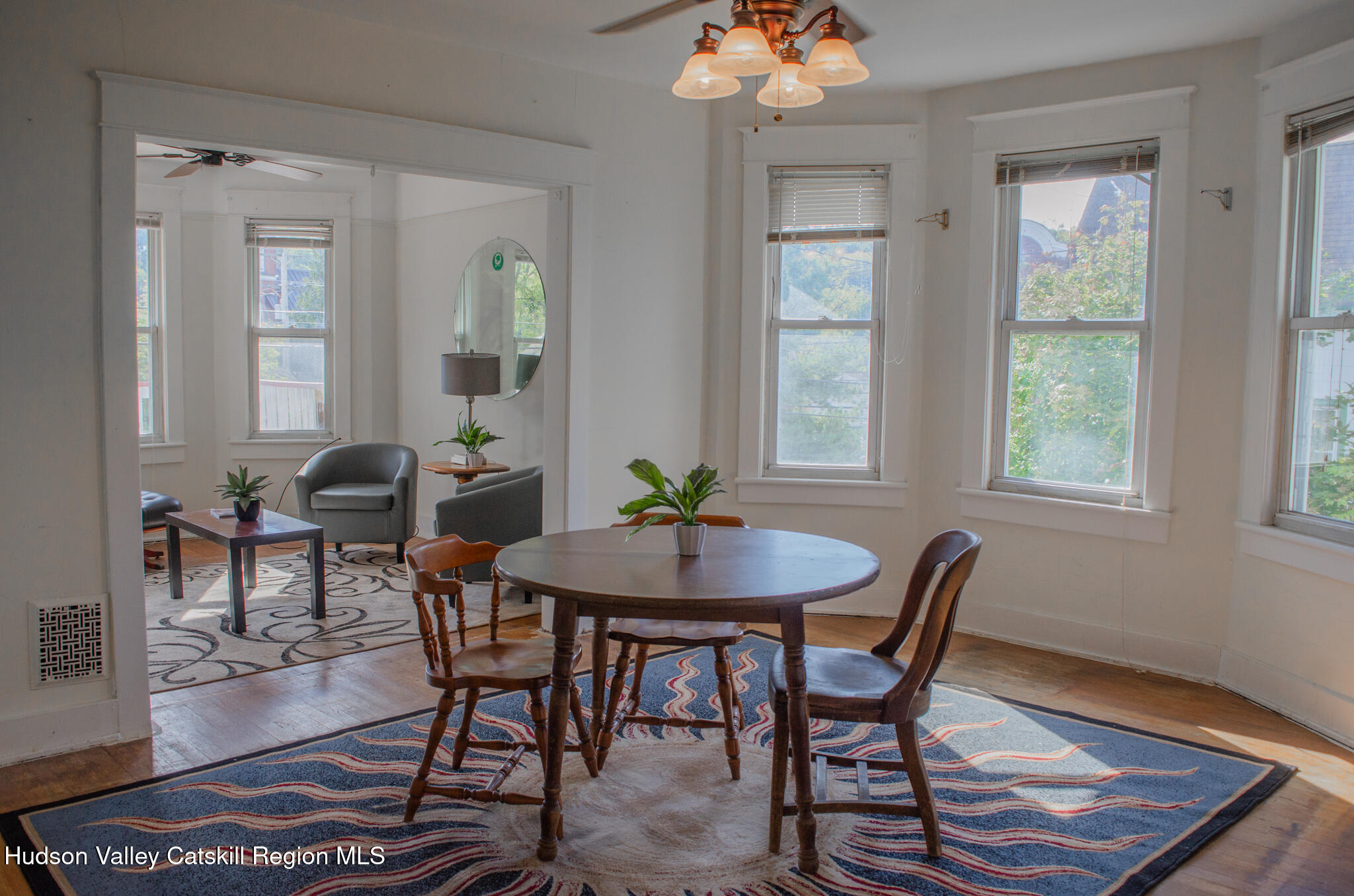 11 3rd Port Ewen, NY 12466 - Photo 21 of 34 a view of a a dining room with furniture window and wooden floor