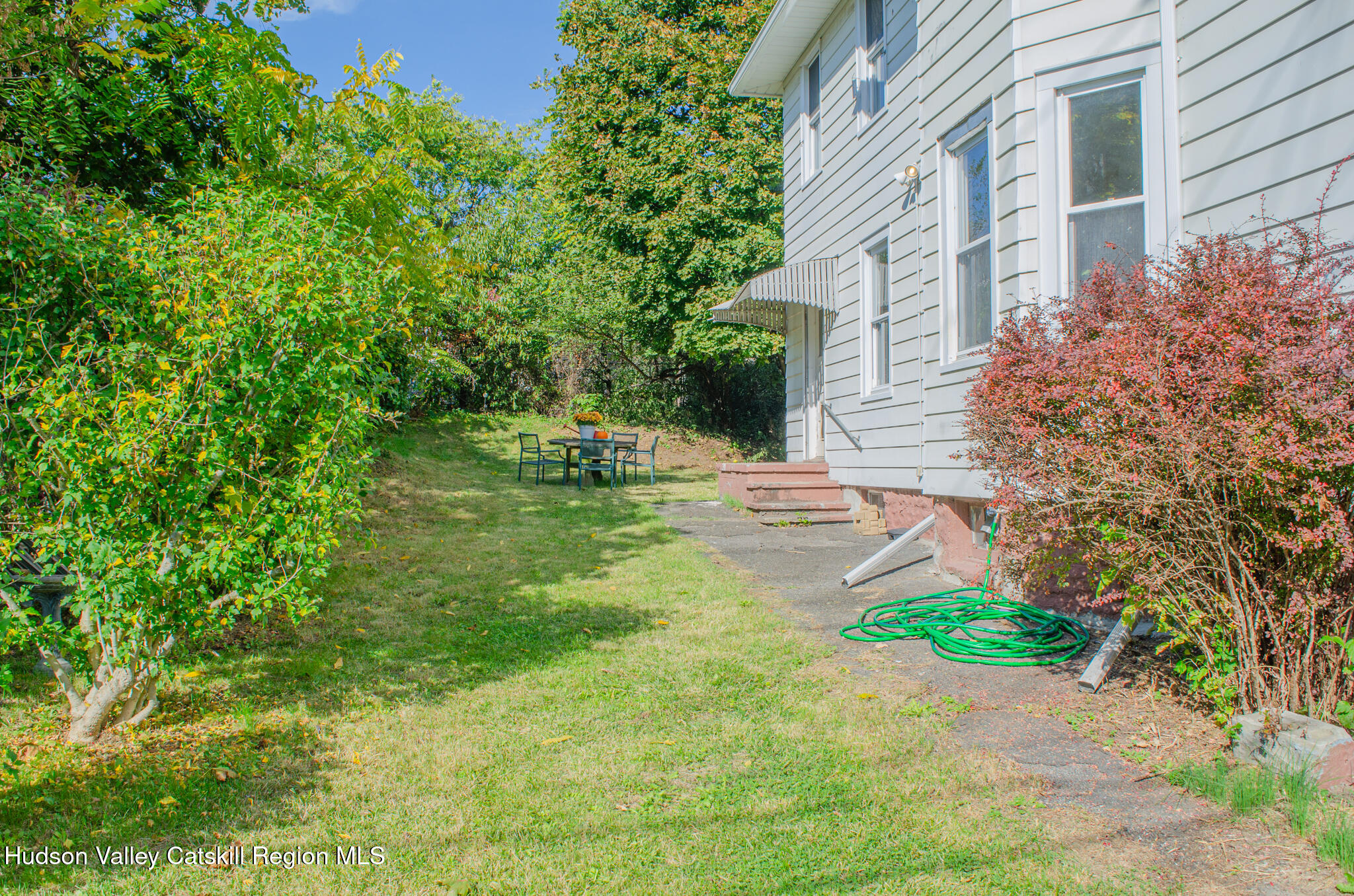 11 3rd Port Ewen, NY 12466 - Photo 30 of 34 a view of a backyard with plants and a patio