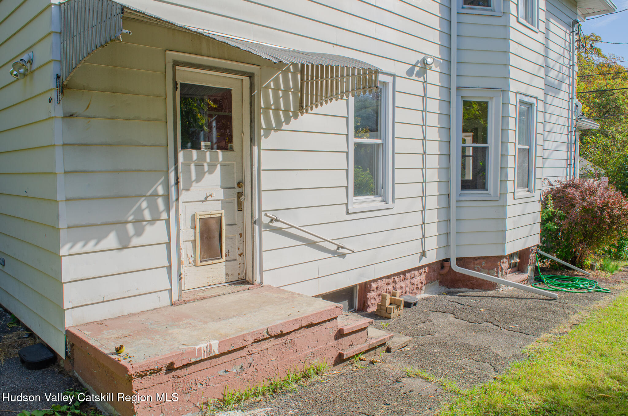 11 3rd Port Ewen, NY 12466 - Photo 32 of 34 a front view of a house with a yard