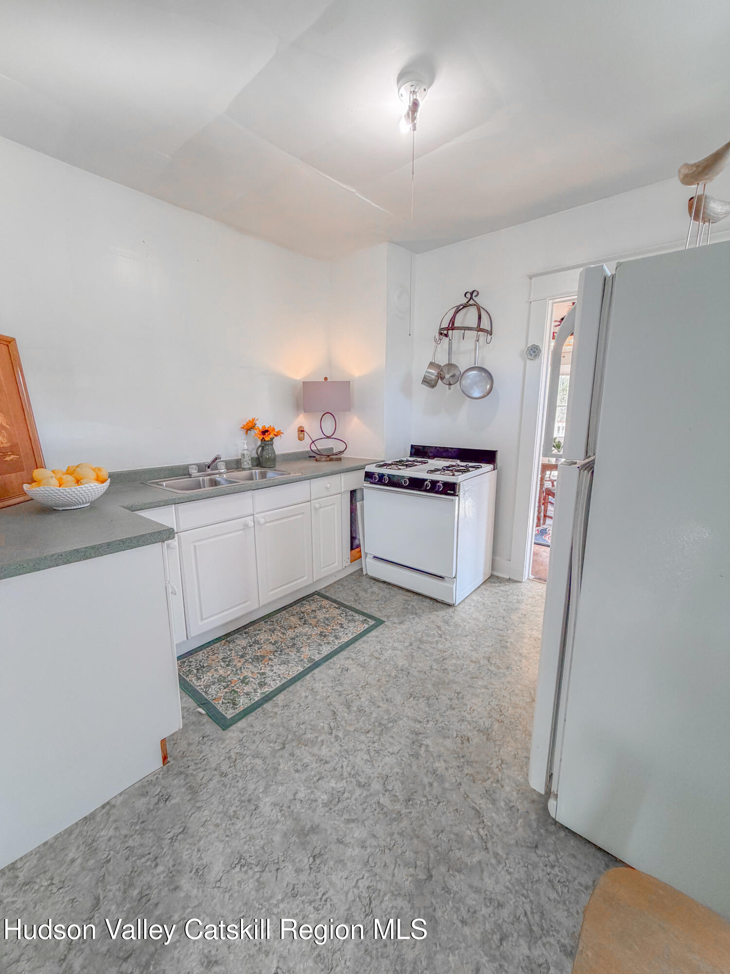 11 3rd Port Ewen, NY 12466 - Photo 8 of 34 a kitchen with stainless steel appliances granite countertop a refrigerator and a stove