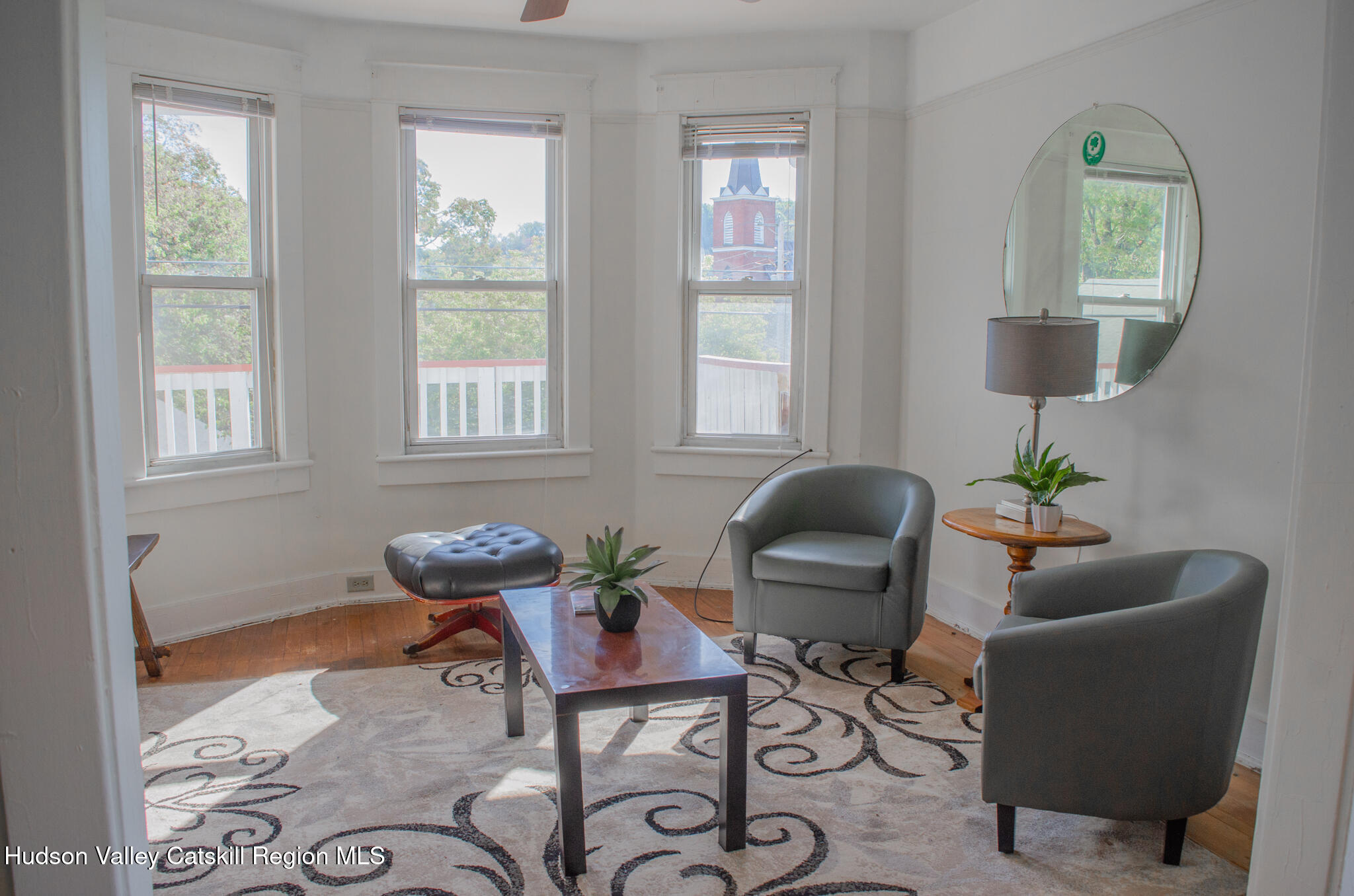 11 3rd Port Ewen, NY 12466 - Photo 10 of 34 a living room with furniture and a window