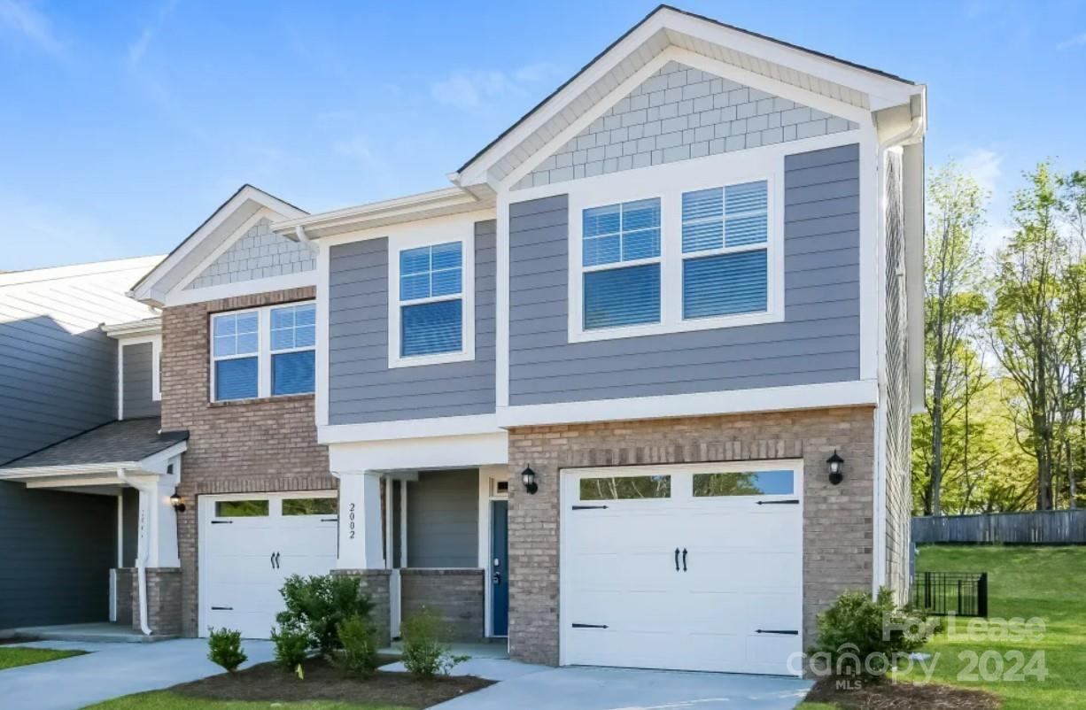2002 Commerce Drive Monroe, NC 28110 - Photo 2 of 7 a front view of a house with white walls