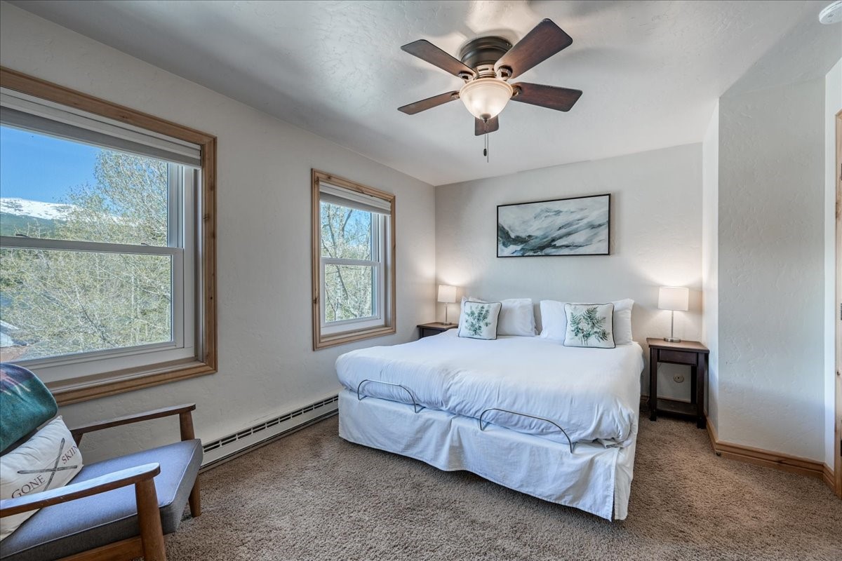 200 North Ridge Street, Unit R A Breckenridge, CO 80424 - Photo 25 of 38 a bedroom with a large bed and a window
