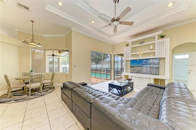 a view of a room that has a door and a mirror