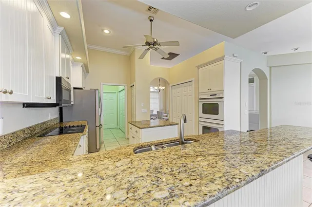 a view of a backyard with a swimming pool