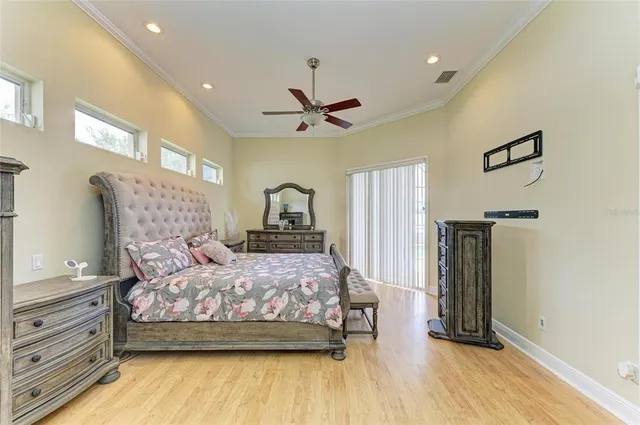 a view of walk in closet with clothes