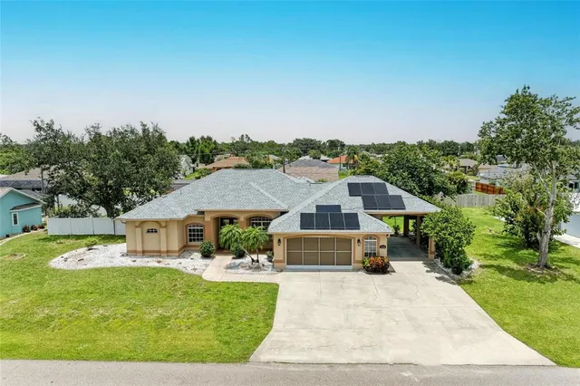 a spacious bedroom with a bed and a window