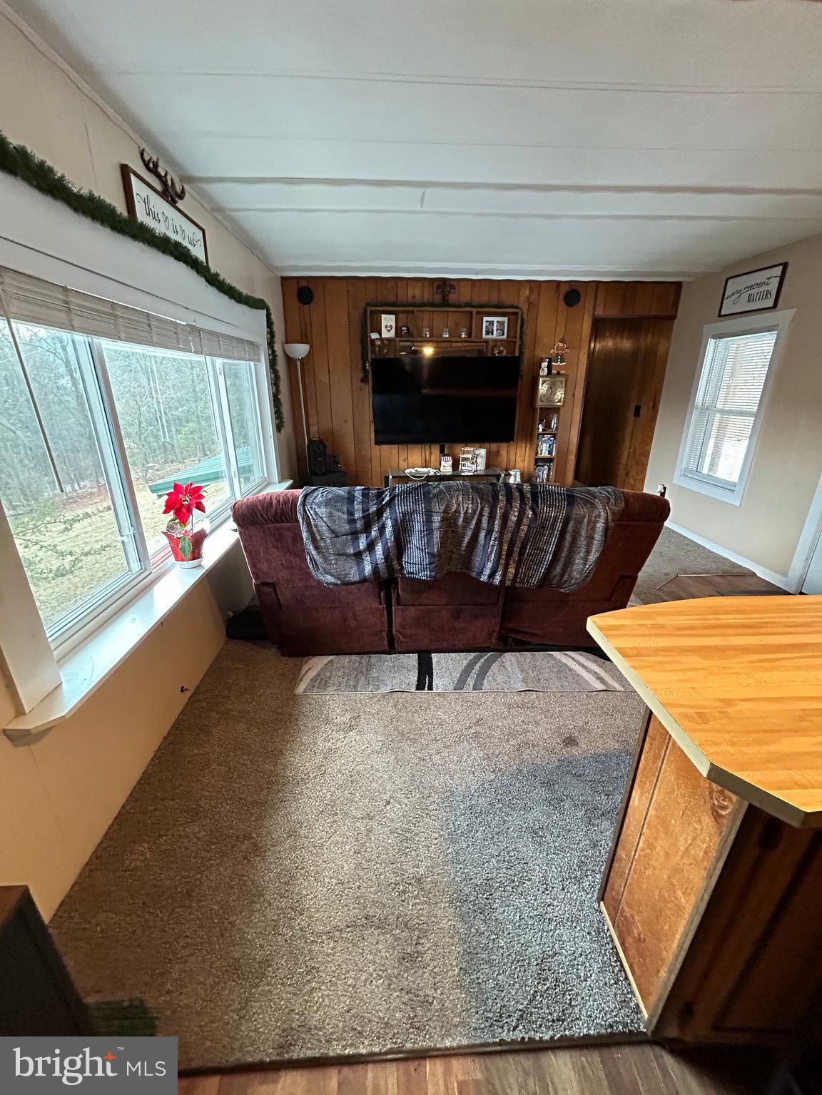 4743-4745 Chambersburg Road Biglerville, PA 17307 - Photo 16 of 101 a living room with furniture and a flat screen tv