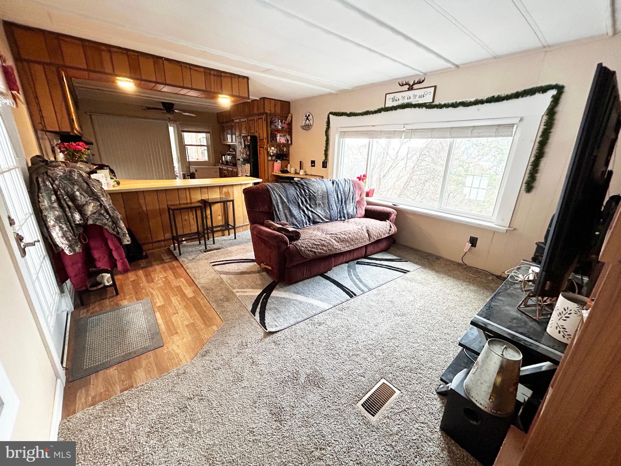 4743-4745 Chambersburg Road Biglerville, PA 17307 - Photo 20 of 101 a living room with furniture and a flat screen tv