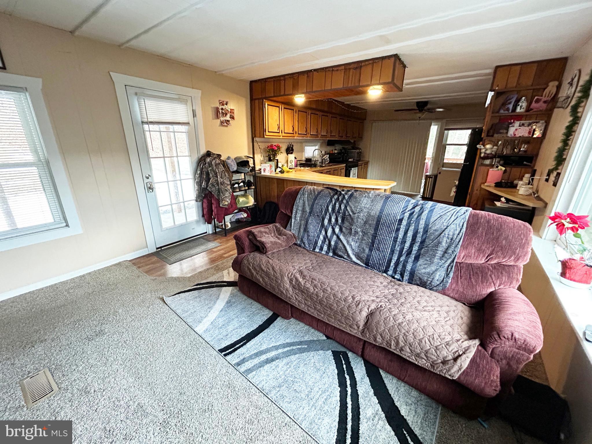 4743-4745 Chambersburg Road Biglerville, PA 17307 - Photo 21 of 101 a living room with furniture and a flat screen tv