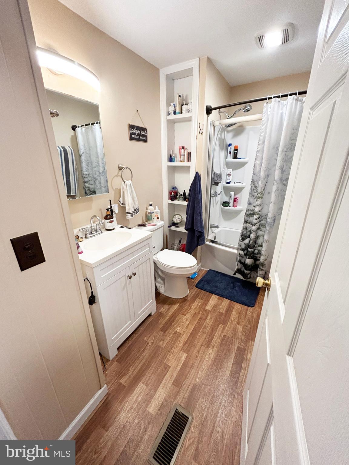 4743-4745 Chambersburg Road Biglerville, PA 17307 - Photo 28 of 101 a bathroom with a sink toilet and shower