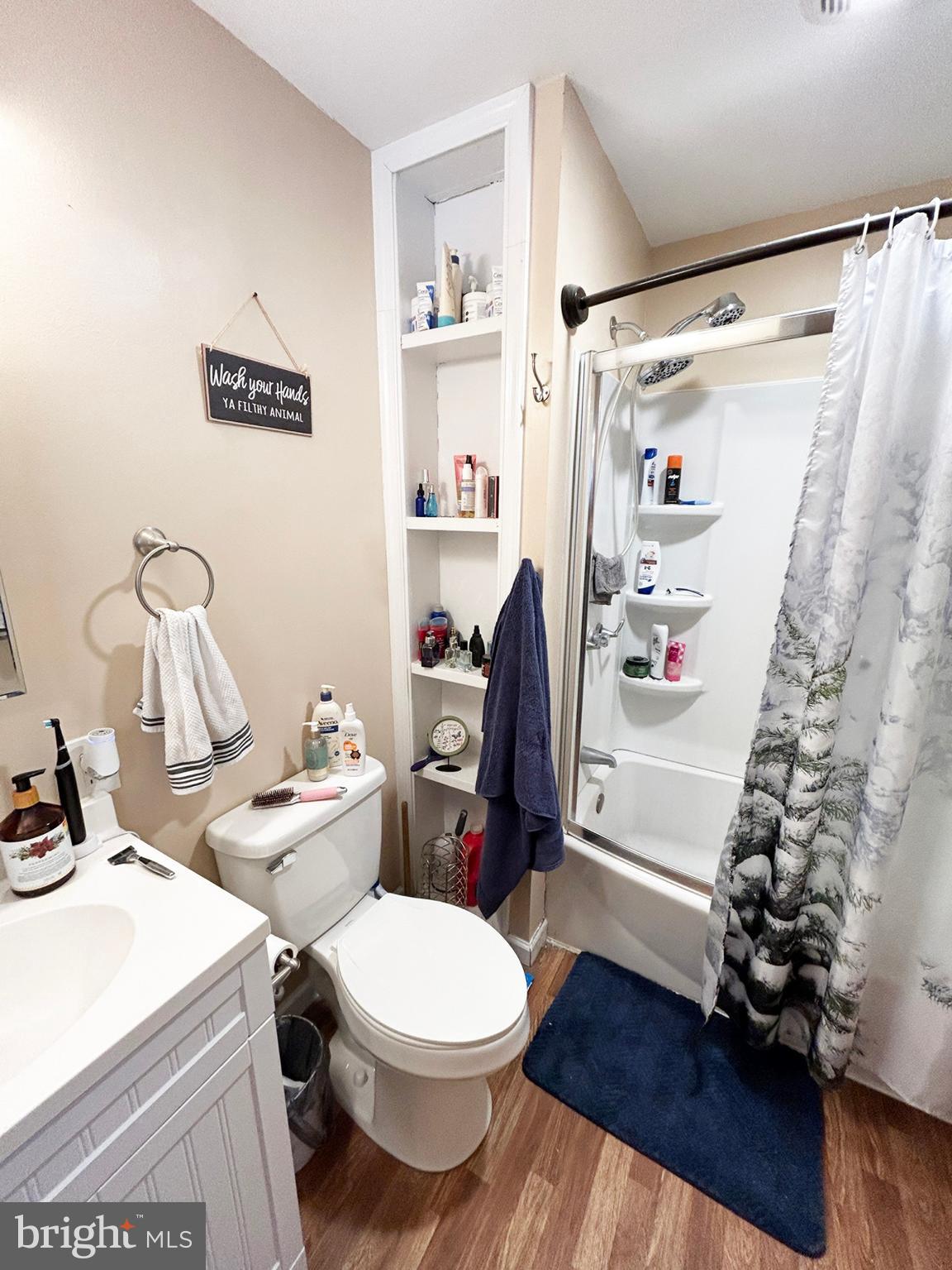 4743-4745 Chambersburg Road Biglerville, PA 17307 - Photo 30 of 101 a bathroom with a sink toilet and shower