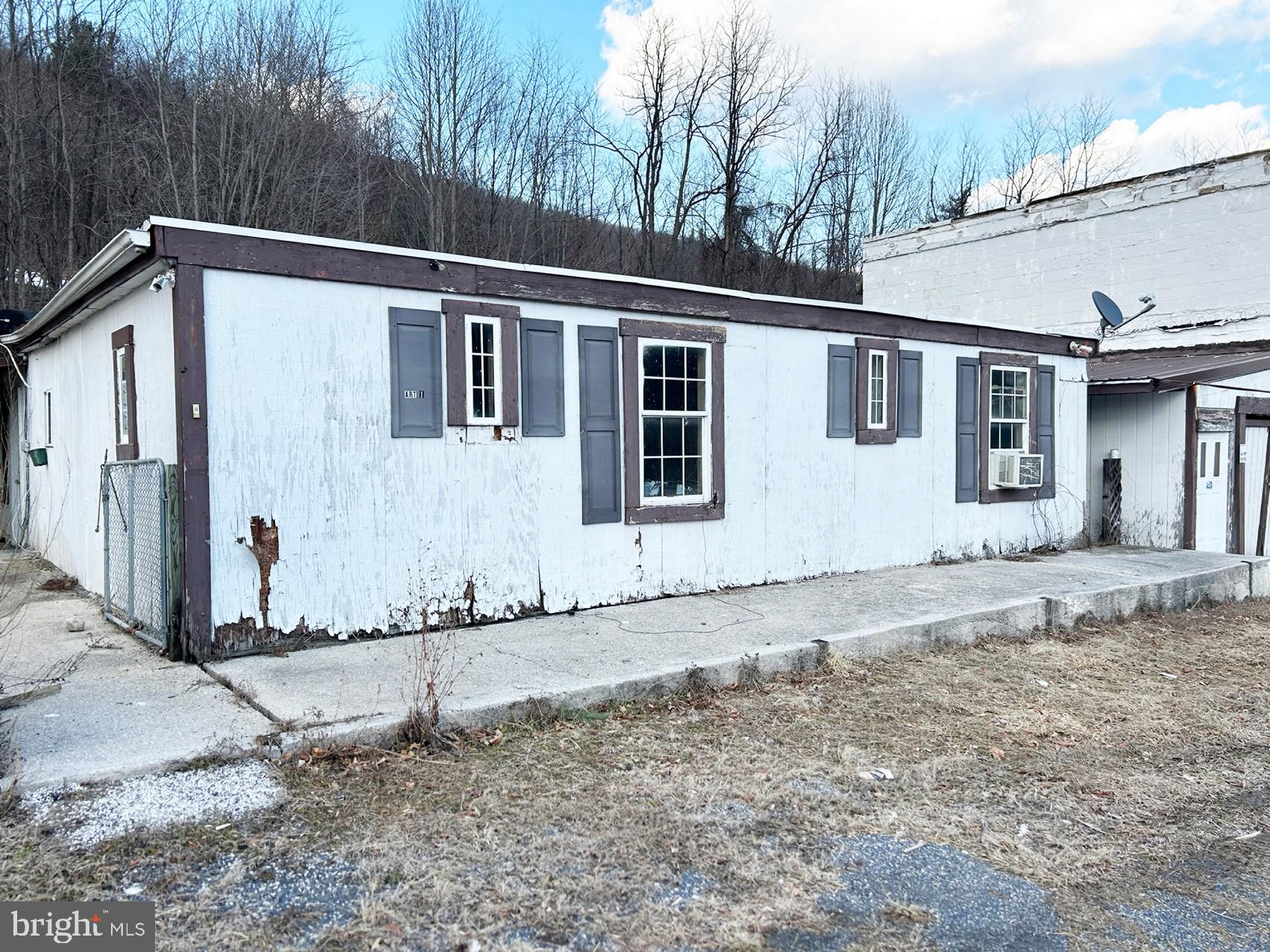 4743-4745 Chambersburg Road Biglerville, PA 17307 - Photo 59 of 101 a front view of a house with a yard
